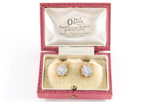 A PAIR OF DIAMOND CLUSTER EAR STUDS