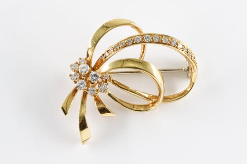 A DIAMOND SET BOUQUET BROOCH