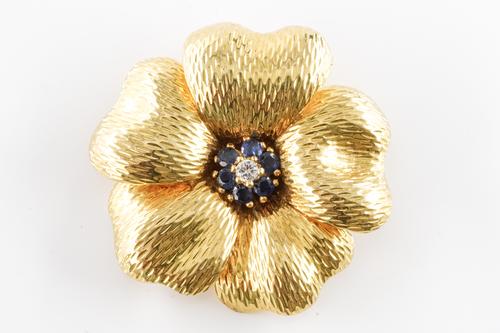 A TIFFANY AND CO DIAMOND AND SAPPHIRE FLOWER BROOCH