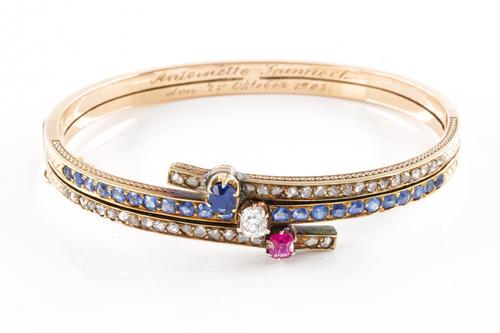 A DIAMOND, RUBY AND SAPPHIRE BANGLE, CIRCA 1900