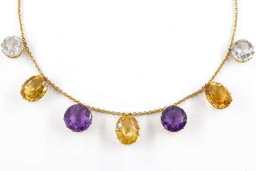 AN EDWARDIAN CITRINE, AMETHYST AND ROCK CRYSTAL NECKLACE