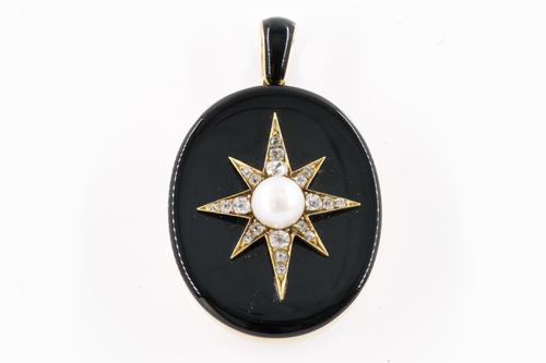 A VICTORIAN DIAMOND AND BLACK ONYX OVAL PENDANT LOCKET