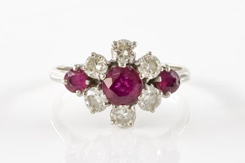 A RUBY AND DIAMOND CLUSTER RING