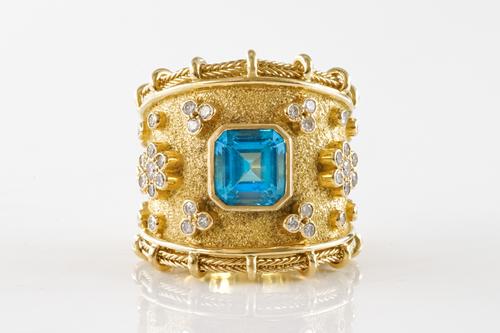 A CONTEMPORARY TOPAZ AND DIAMOND RING