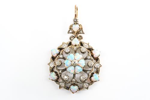 A VICTORIAN OPAL AND DIAMOND PENDANT BROOCH