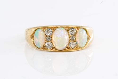 A VICTORIAN OPAL AND DIAMOND RING