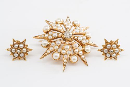 A VICTORIAN DIAMOND AND SEED PEARL STAR BROOCH AND MATCHING EARRINGS (2)