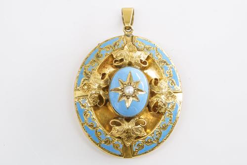 A VICTORIAN PEARL AND ENAMEL PENDANT LOCKET