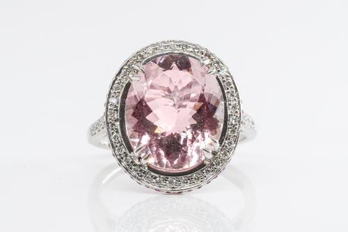 A MORGANITE AND DIAMOND RING