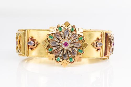 A CARLO GIULIANO GEM SET BANGLE