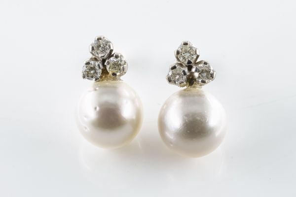 A PAIR OF DIAMOND AND PEARL EARRINGS