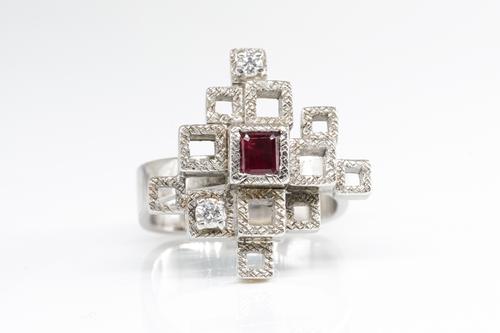 AN ANDREW GRIMA RUBY AND DIAMOND RING