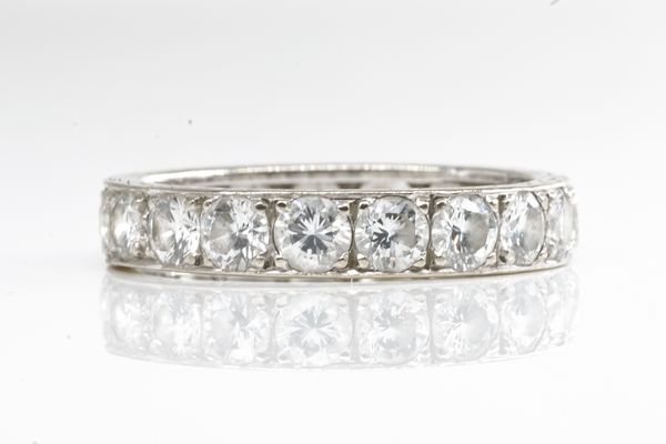 AN ART DECO FULL DIAMOND ETERNITY RING