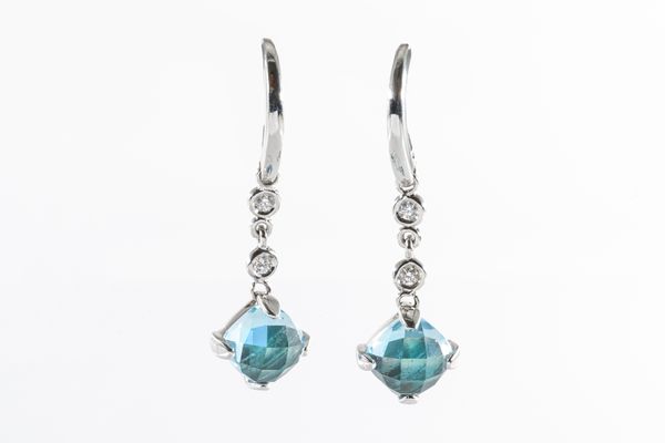 A PAIR OF WHITE GOLD, BLUE TOPAZ AND DIAMOND EARRINGS