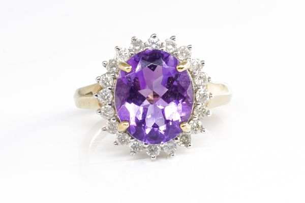 A 9CT GOLD, AMETHYST AND DIAMOND CLUSTER RING