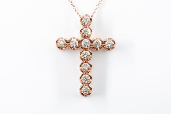 A DIAMOND SET CROSS PENDANT AND CHAIN