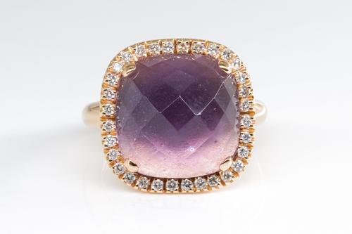 AN AMETHYST AND DIAMOND RING