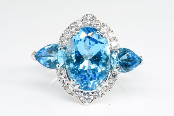 A LARGE BLUE TOPAZ AND DIAMOND RING