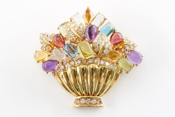 A MULTI GEM AND DIAMOND BROOCH