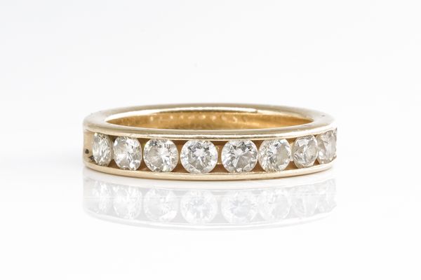 A DIAMOND HALF ETERNITY RING