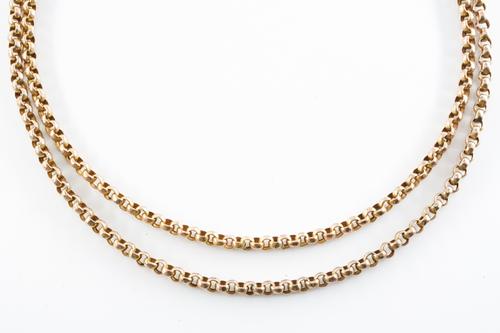 A VICTORIAN GOLD LONG GUARD CHAIN