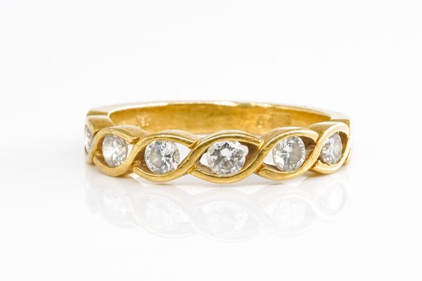 A DIAMOND HALF ETERNITY RING