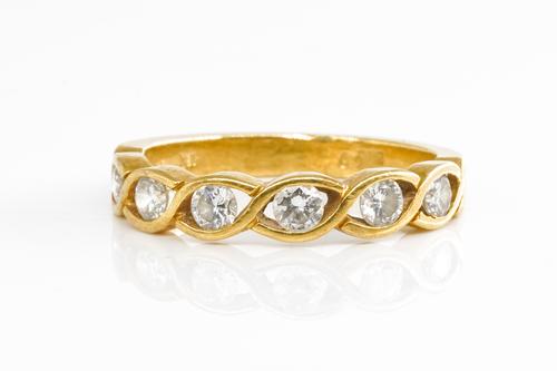 A DIAMOND HALF ETERNITY RING