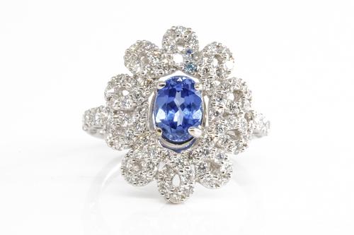 A CONTEMPORARY SAPPHIRE AND DIAMOND RING
