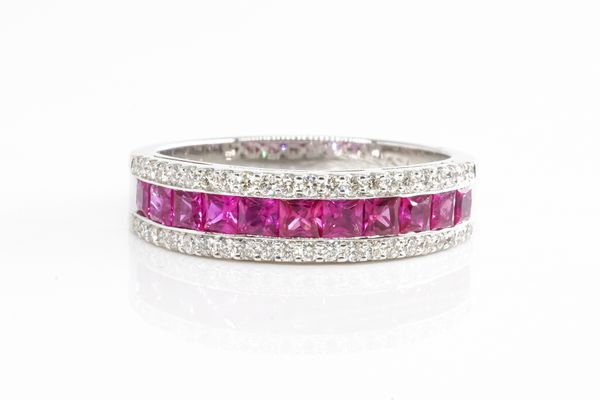 A RUBY AND DIAMOND HALF ETERNITY RING