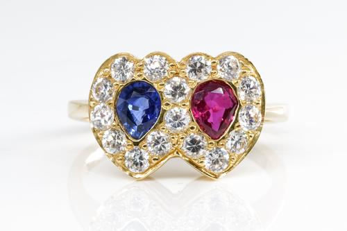 A RUBY AND SAPPHIRE HEART RING