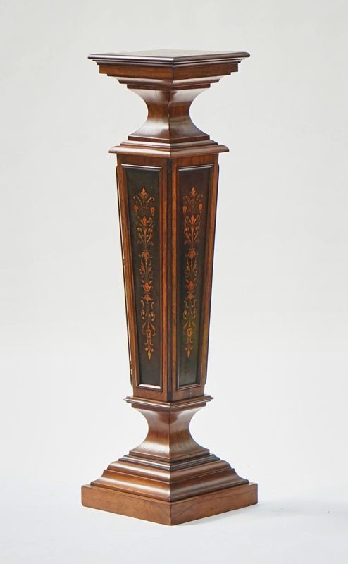 An Edwardian inlaid rosewood jardiniere stand