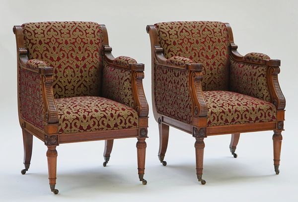 A pair of mahogany framed square back armchairs