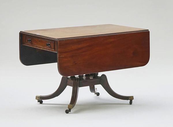 A George III mahogany drop flap centre table