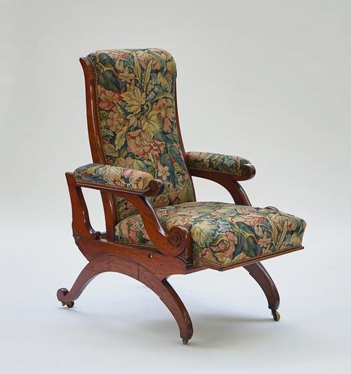 A VICTORIAN MAHOGANY OPEN ARM ADJUSTABLE EASY ARMCHAIR