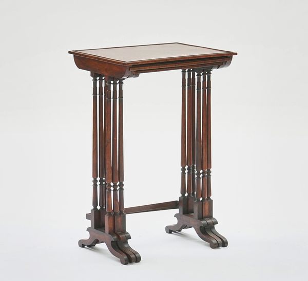 A nest of three Regency rosewood occasional tables