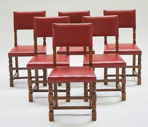 A set of eight 17th century style oak framed square back dining chairs