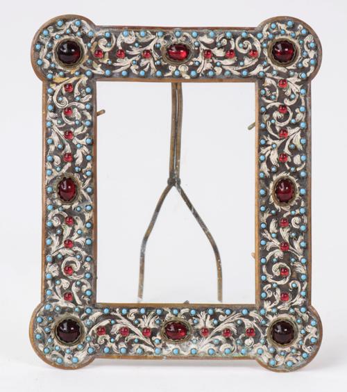A gilt-metal and cabochon set photograph frame