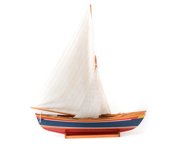 Two painted wooden model pond yachts