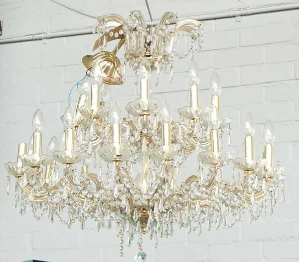 A gilt-metal and glass twenty-four light chandelier