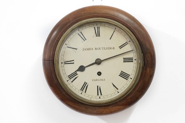 A mahogany wall clock