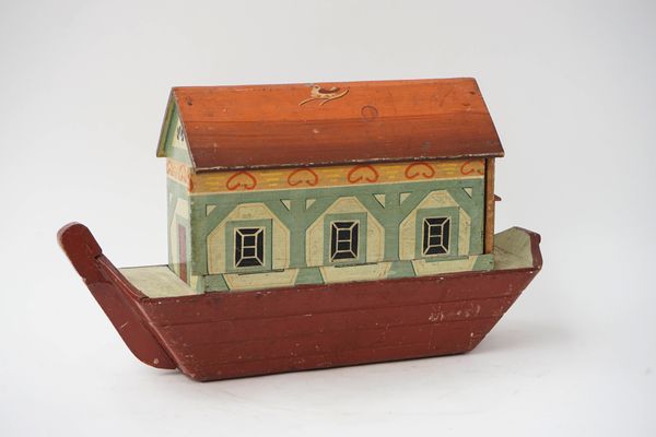 Folk Art: A painted wood Noah's Ark and a collection of carved animals and figures