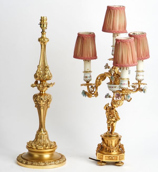 An Italian gilt-metal and porcelain mounted four light candelabra