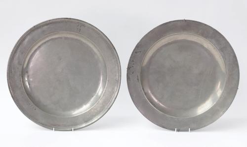 A PEWTER SINGLE-REED CHARGER AND ANOTHER (2)