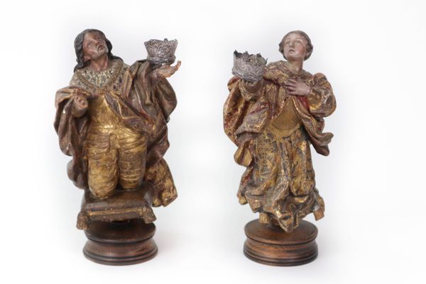 A pair of polychrome-decorated and parcel-gilt figures