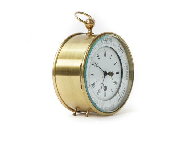 A brass cased clock barometer