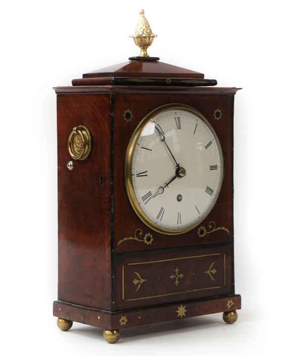 A mahogany and brass inlaid bracket timepiece