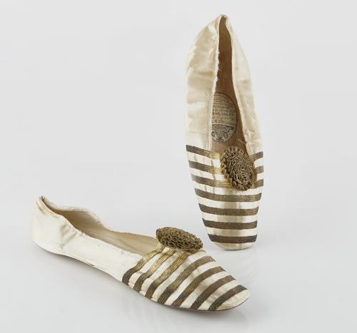 Queen Victoria's cream satin and gold thread ballet style slippers, circa 1840s/1850s