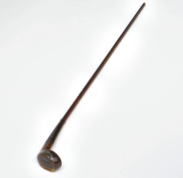 A mahogany Sunday golf club walking stick