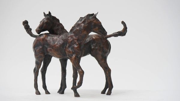 A bronze sculpture 'Two Foals'