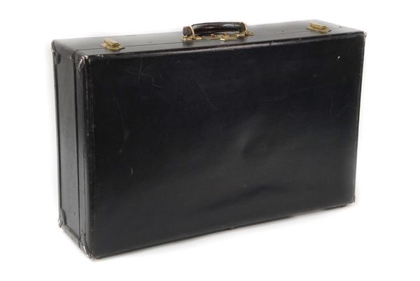 Hermes Paris; a black leather suitcase